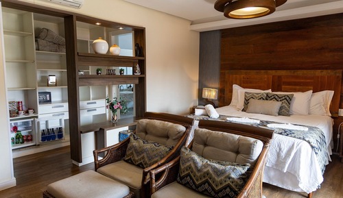 Suite Deluxe, 1 cama de matrimonio grande, Aire acondicionado, vistas parciales al mar