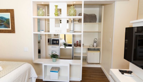 Suite Deluxe, 1 cama de matrimonio grande, Aire acondicionado, vistas parciales al mar