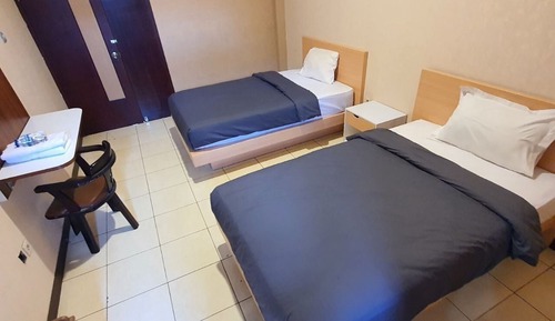 Habitación con 2 camas individuales