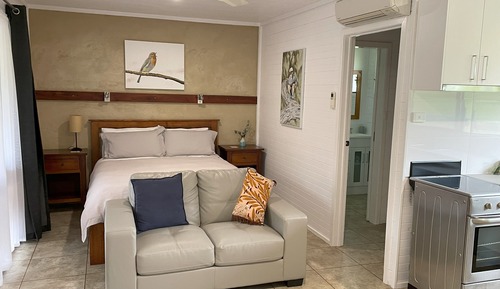 Suite estudio Deluxe, varias camas, cocina, vistas al jardín