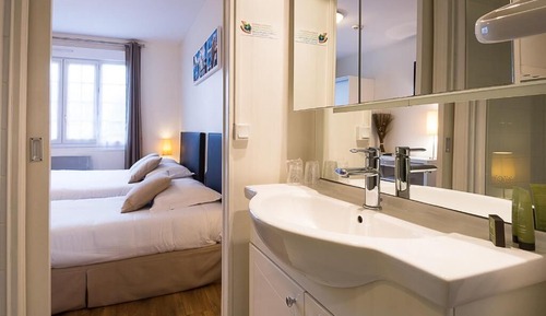 Habitación triple, vistas al mar