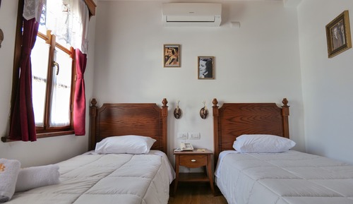 Habitación estándar con 1 cama doble o 2 individuales