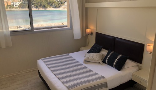 Habitación cuádruple, vistas a la playa (Duplex)