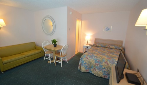 Habitación Deluxe doble, 1 cama doble con sofá cama, vistas parciales al mar