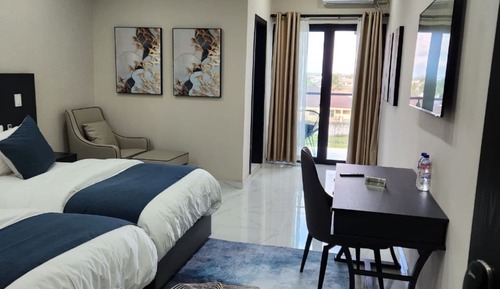 Habitación Deluxe con 1 cama doble o 2 individuales