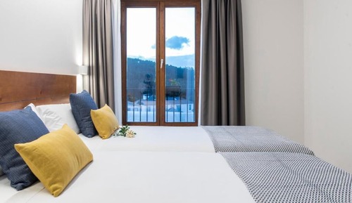 Habitación Deluxe con 2 camas individuales, vistas parciales al mar