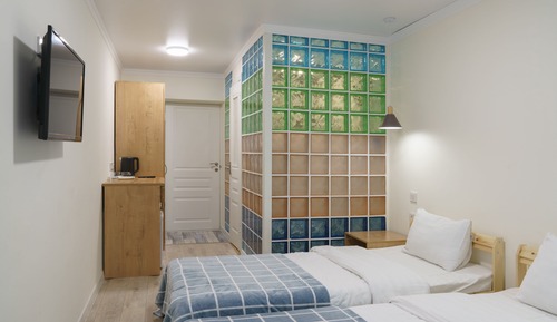 Habitación superior con 1 cama doble o 2 individuales