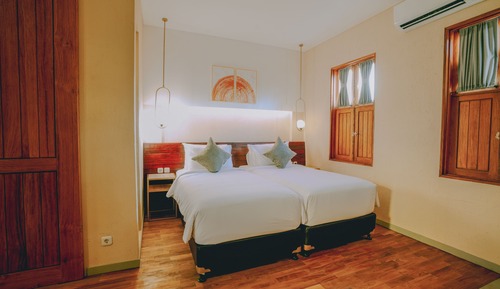 Habitación Deluxe con 1 cama doble o 2 individuales