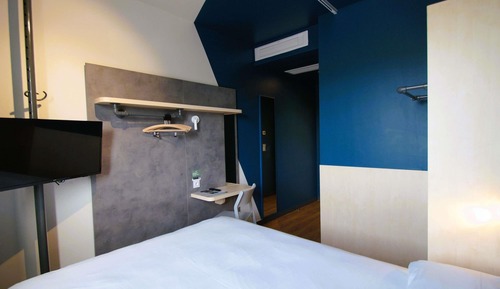 Habitación triple, varias camas