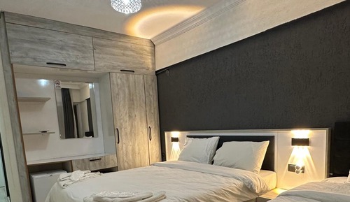 Habitación triple Confort, balcón, vistas a la ciudad