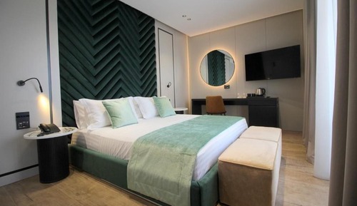 Habitación triple Deluxe, 1 cama de matrimonio grande con sofá cama, no fumadores, vistas al mar