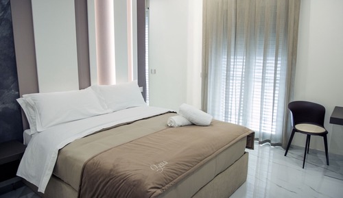 Habitación cuádruple Deluxe, balcón, vistas a la ciudad