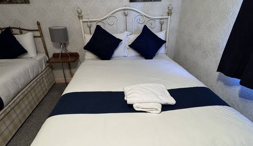 Habitación triple Deluxe