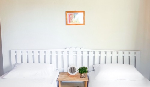 Habitación estándar con 2 camas individuales, varias camas, vistas al jardín