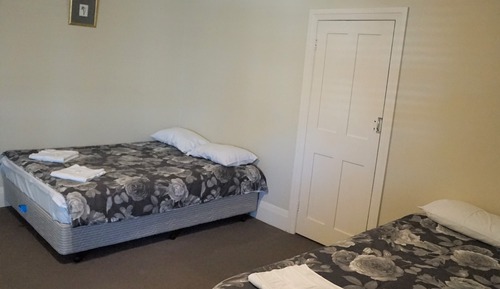 Habitación cuádruple familiar, baño compartido