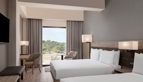 Habitación Deluxe, 2 camas de matrimonio, vistas a la piscina