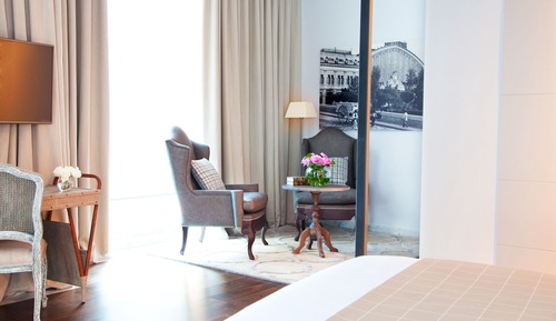 Habitación junior con 1 cama doble o 2 individuales, vistas al jardín