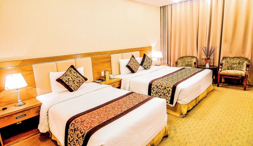 Habitación triple Deluxe