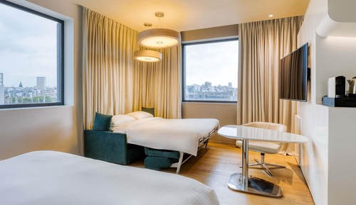 Habitación familiar, 1 cama de matrimonio grande con sofá cama, vistas a la ciudad
