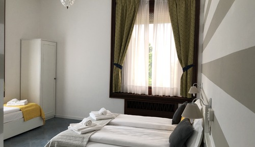 Habitación triple, vistas al jardín