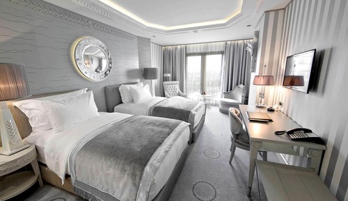 Habitación Deluxe, 2 camas individuales, vistas parciales al mar