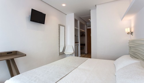 Habitación triple, vistas al mar