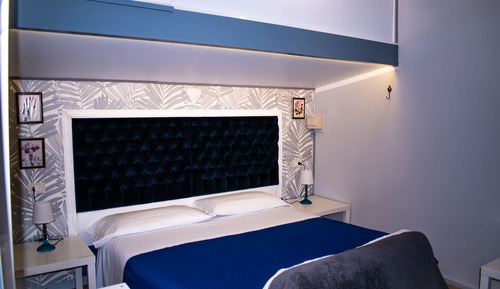 Habitación estándar con 1 cama doble o 2 individuales, cocina básica