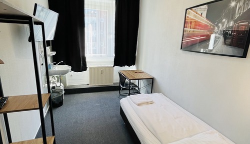 Habitación individual, baño compartido