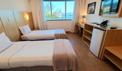 Habitación superior con 2 camas individuales, 2 camas individuales, vistas parciales al mar