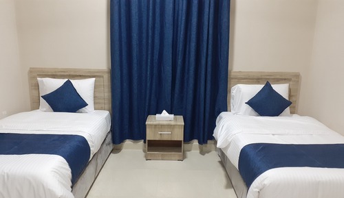 Habitación superior con 2 camas individuales