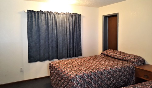 Habitación, varias camas