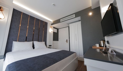 Habitación estándar con 1 cama doble o 2 individuales