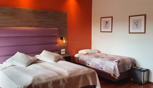 Habitación triple superior, balcón