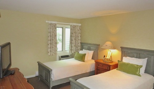 Habitación, varias camas