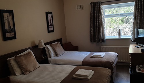 Habitación con 2 camas individuales