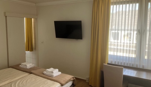 Habitación Confort con 1 cama doble o 2 individuales