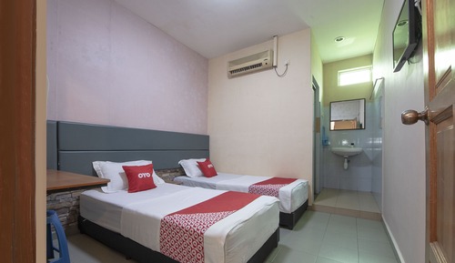 Habitación con 2 camas individuales