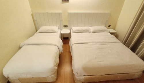 Habitación triple Deluxe