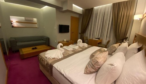 Habitación Elite con 1 cama doble o 2 individuales