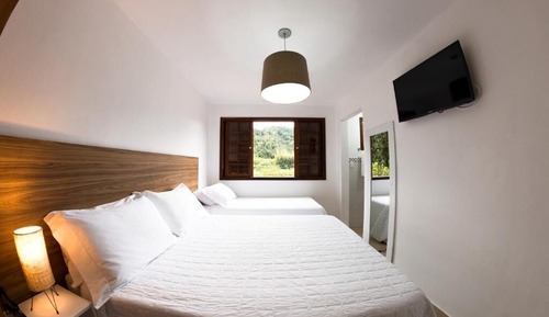 Habitación triple superior, varias camas