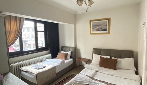 Habitación triple económica, varias camas