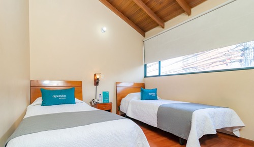 Habitación con 2 camas individuales