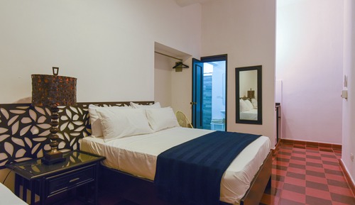 Habitación triple Elite, varias camas