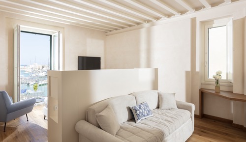 Habitación cuádruple ejecutiva, balcón, vistas al puerto (Le Sciale)