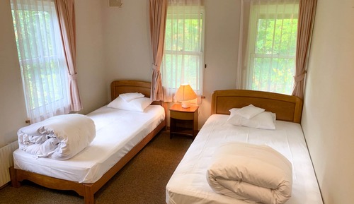 Habitación triple clásica, baño compartido