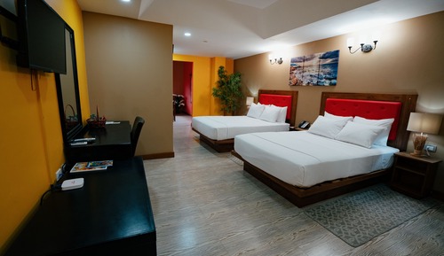 Habitación cuádruple Deluxe, 2 camas de matrimonio