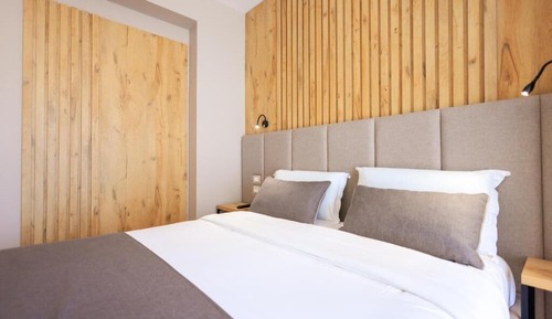 Habitación cuádruple Deluxe, balcón, vistas parciales al mar