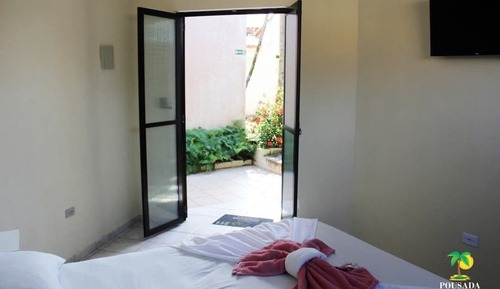 Habitación triple Deluxe, patio