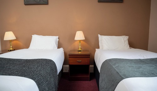 Habitación con 2 camas individuales