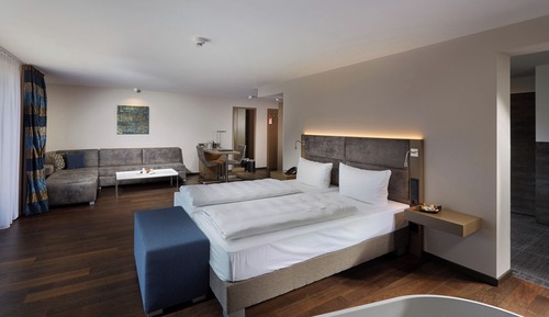 Suite superior, varias camas, balcón